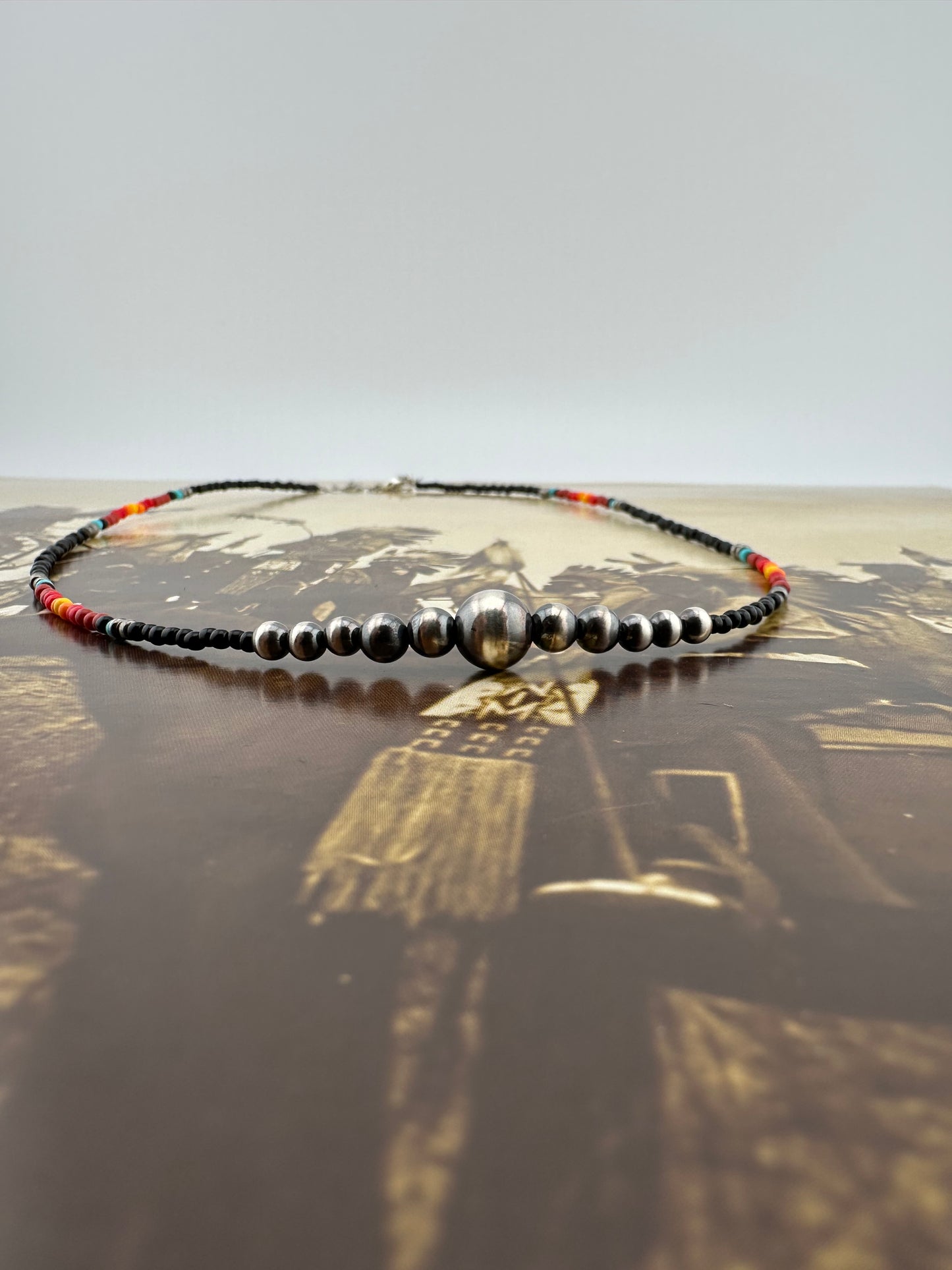 Beaded necklace with sterling silver beads