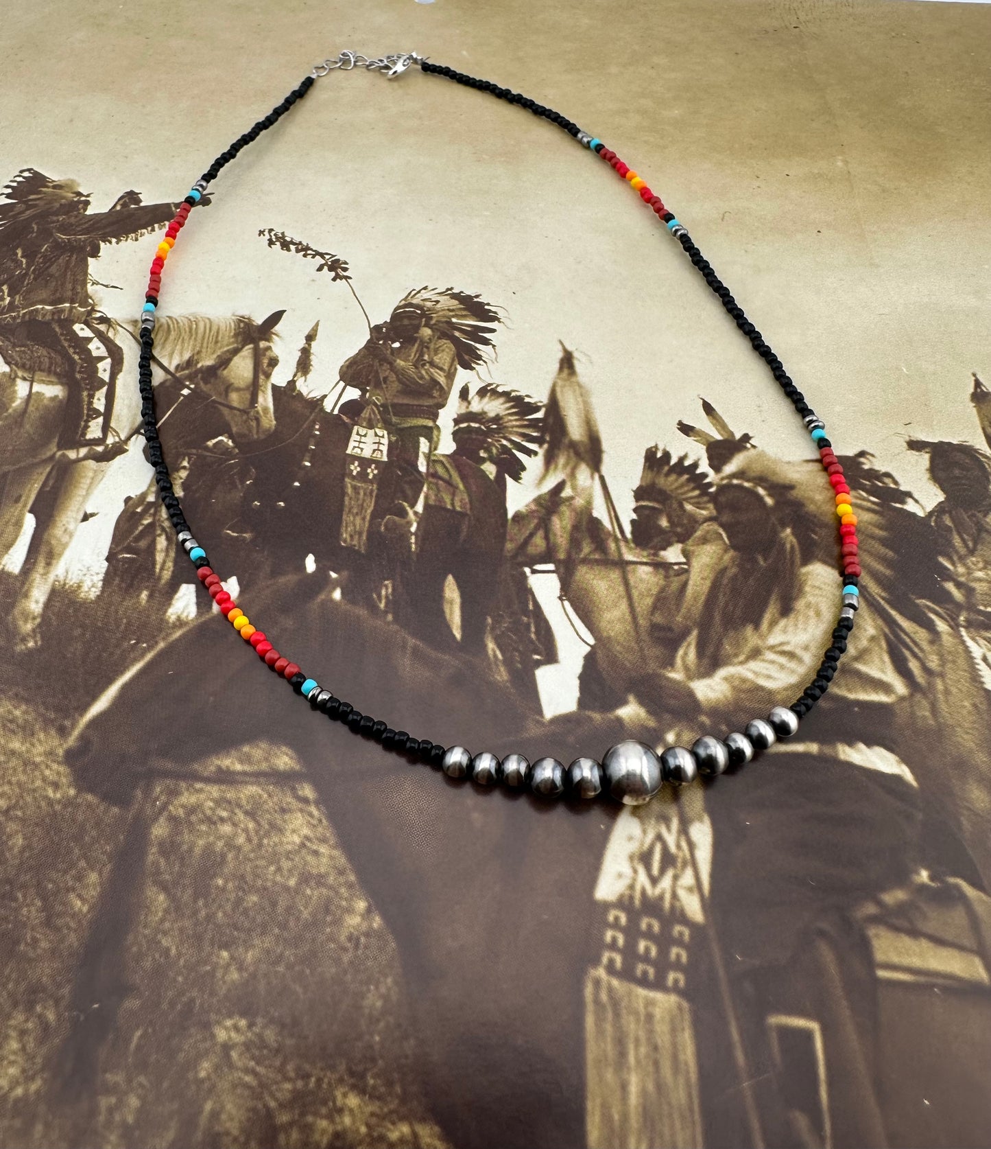 Beaded necklace with sterling silver beads