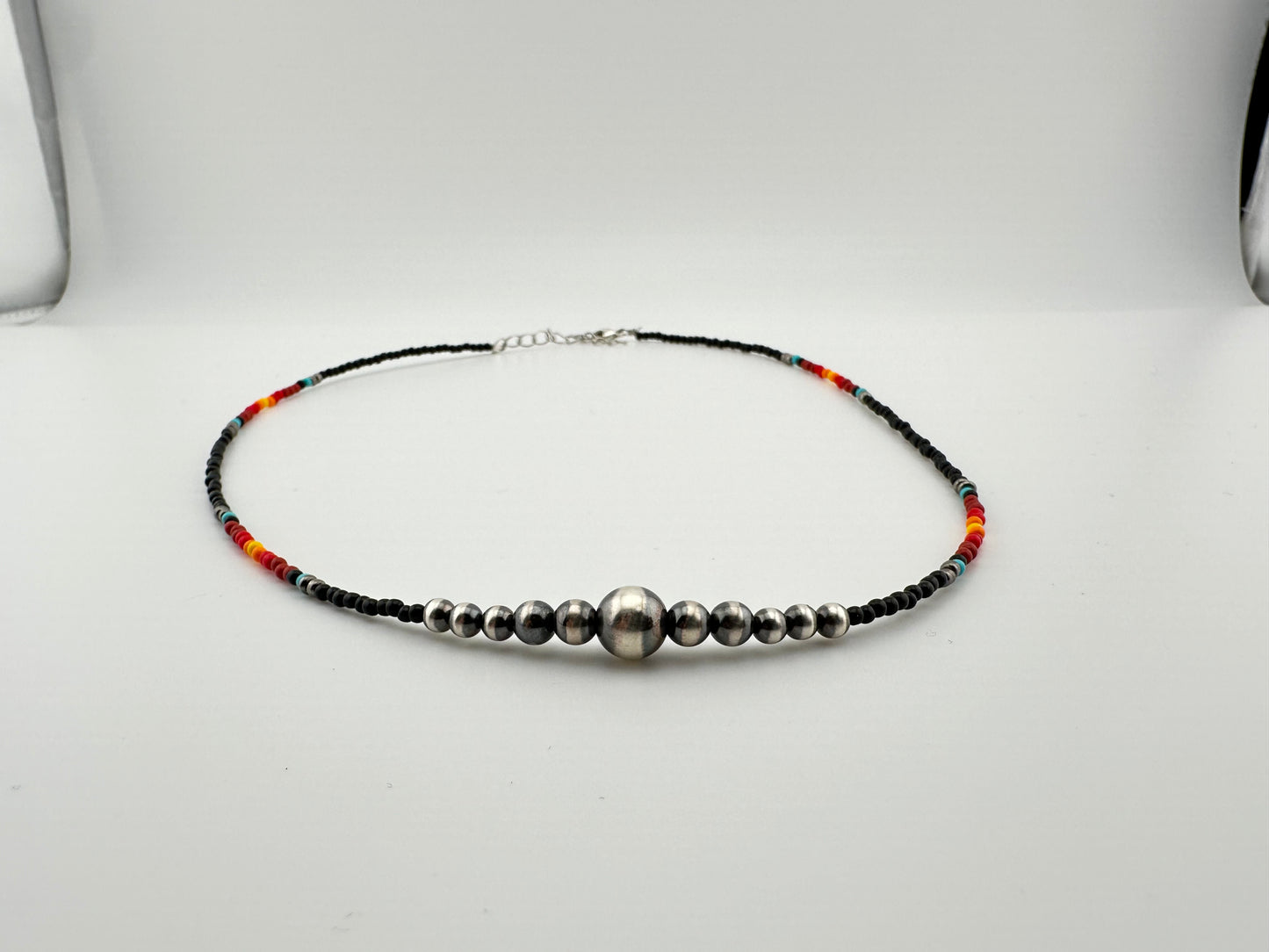Beaded necklace with sterling silver beads